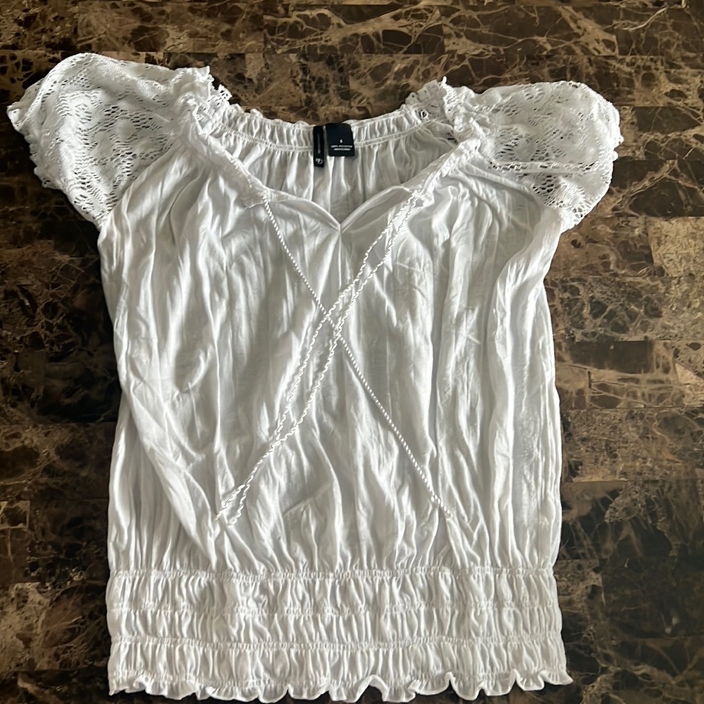 A loosely fitted, white shirt